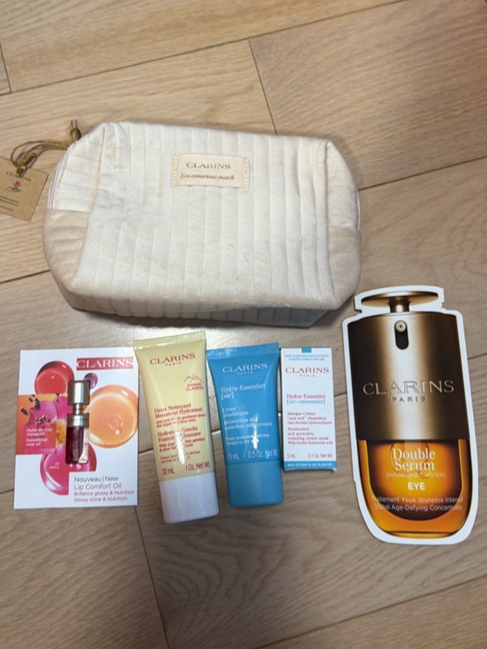 Clarins Cream Quilted Cosmetic Pouch with Skincare Samples